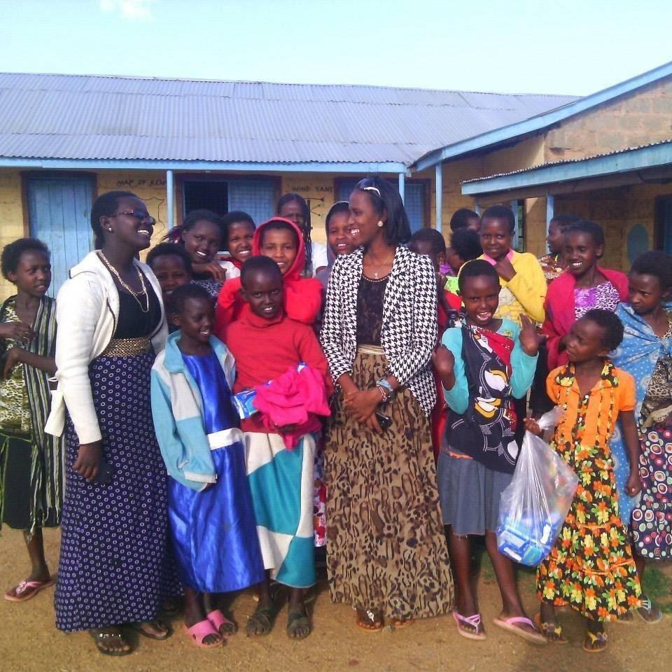 Schoolgirls receiving BFFS dignity kits